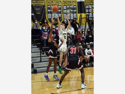 River Dell varsity boys basketball team holds off  late charge to beat Fort Lee 55-50 in season opener