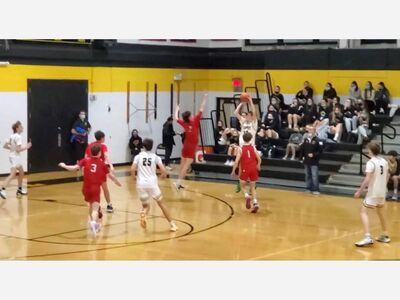 River Dell varsity boys basketball team extends winning streak to eight games with an overtime win over Westwood