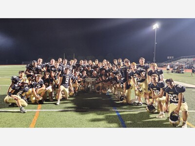 River Dell Golden Hawks varsity football team recaptures the  Battle of Midland Ave.  Trophy in a 42-14 victory over Paramus