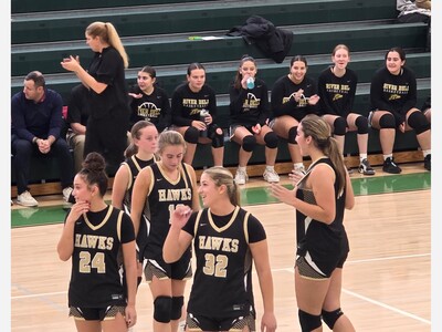 River Dell Varsity Girls Basketball Team puts up a valiant fight in a loss to Old Tappan in the Joe Poli Tournament.